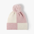 Gorro de punto con bloques de color y pompón