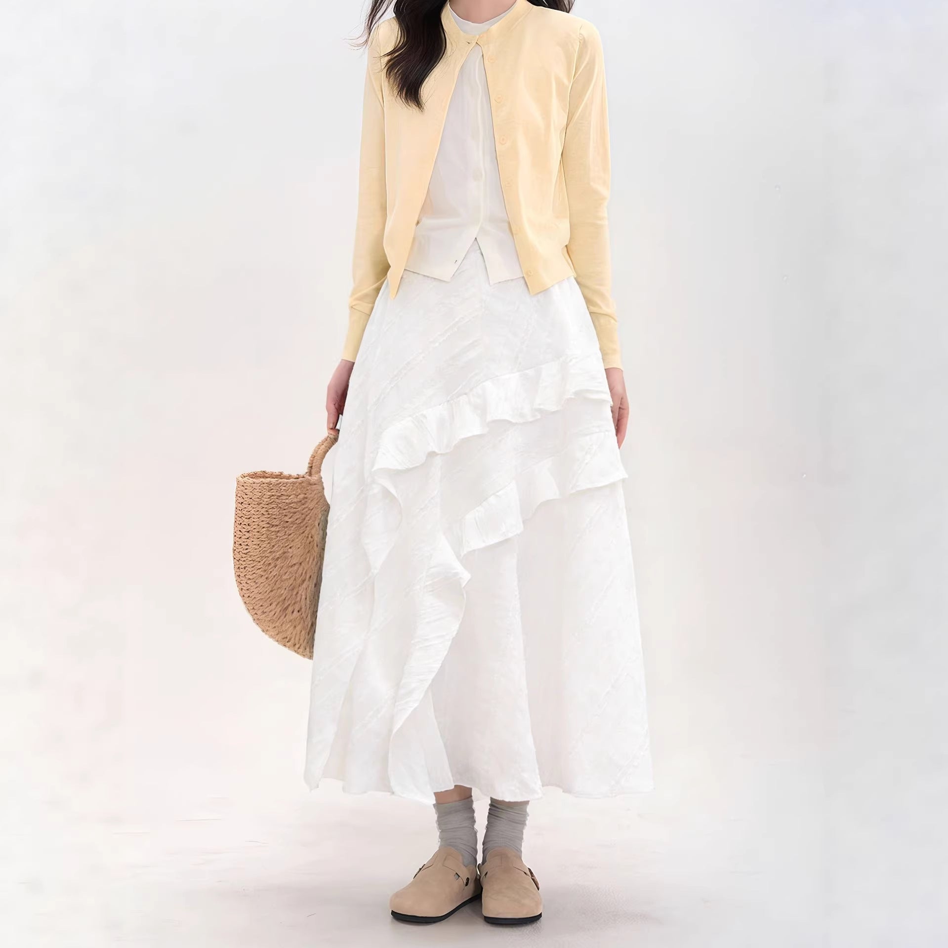 Jupe midi trapèze asymétrique blanche taille haute amincissante à étages