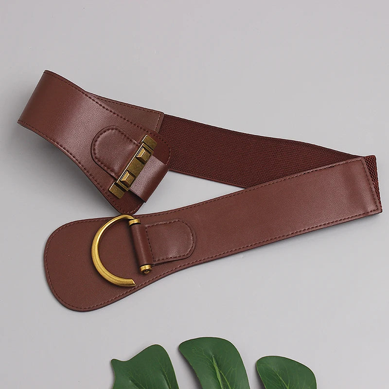 Wide gold-buckle belt side view