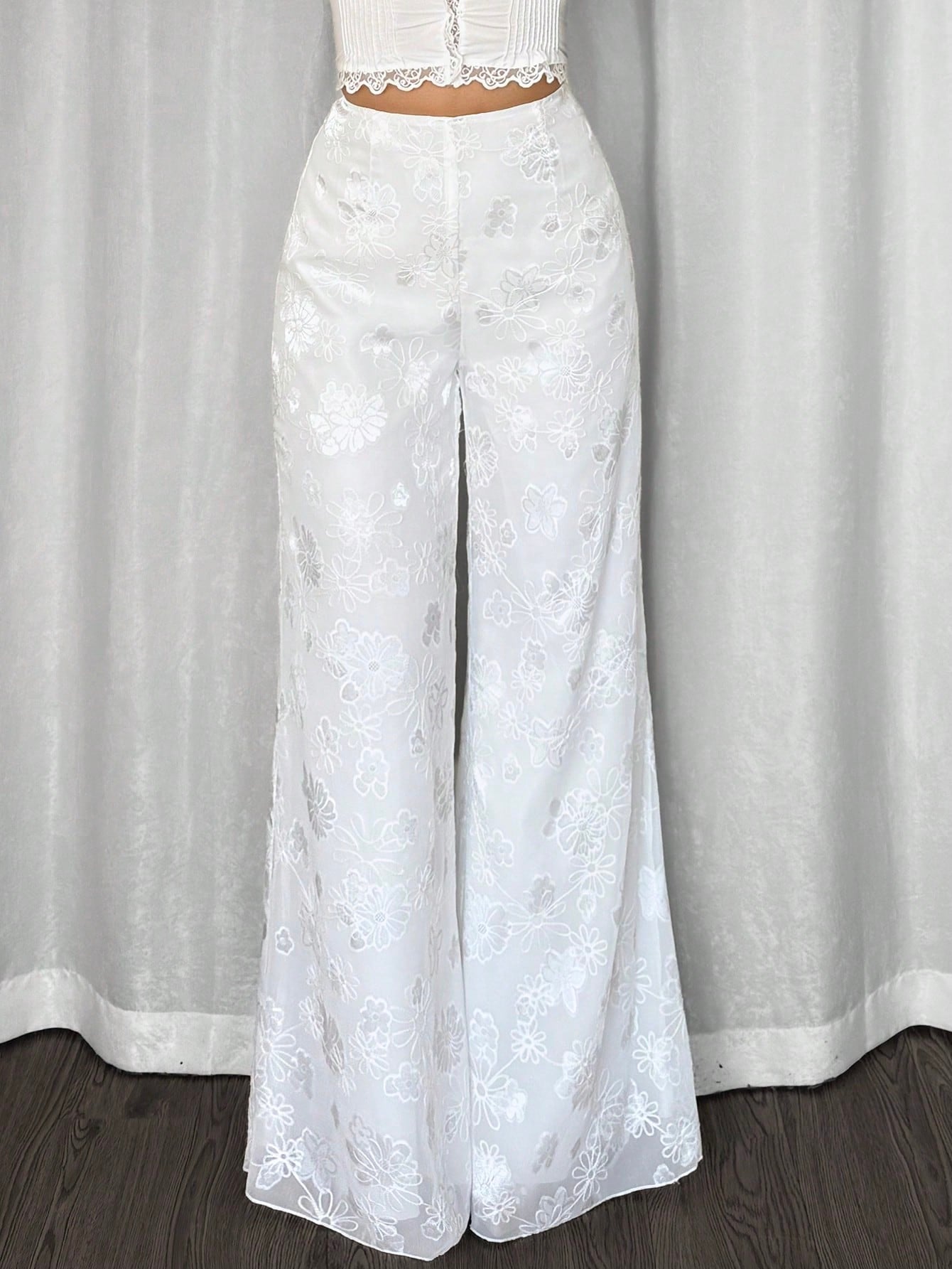 Pantalones de pernera ancha de talle alto