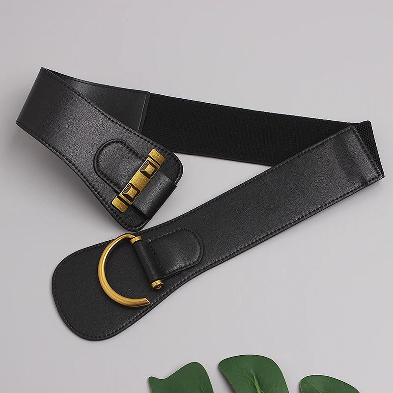 Gold-buckle belt buckle close-up