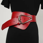 Wide leather belt laid flat showing full length