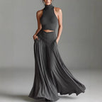 Ensemble deux pièces style top sans manches col montant et élégante robe longue