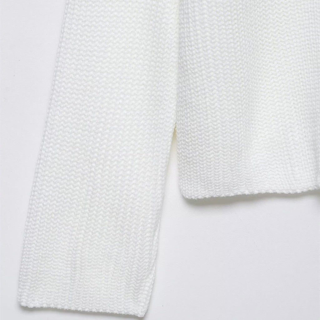 Pull en maille ample à col montant, fendu et de couleur unie