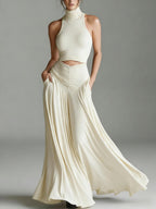 Ensemble deux pièces style top sans manches col montant et élégante robe longue