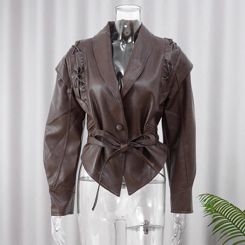 Veste à manches courtes/longues avec ceinture.