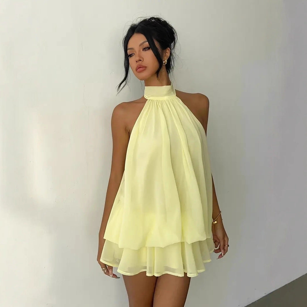 Robe d'été ajustée dos nu à licou et taille nouée, avec jupe courte bouffante pour femme
