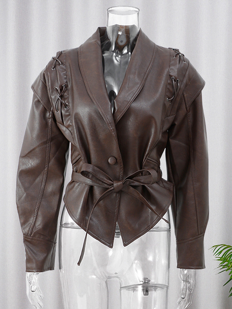 Veste à manches courtes/longues avec ceinture.