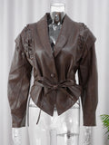 Veste à manches courtes/longues avec ceinture.