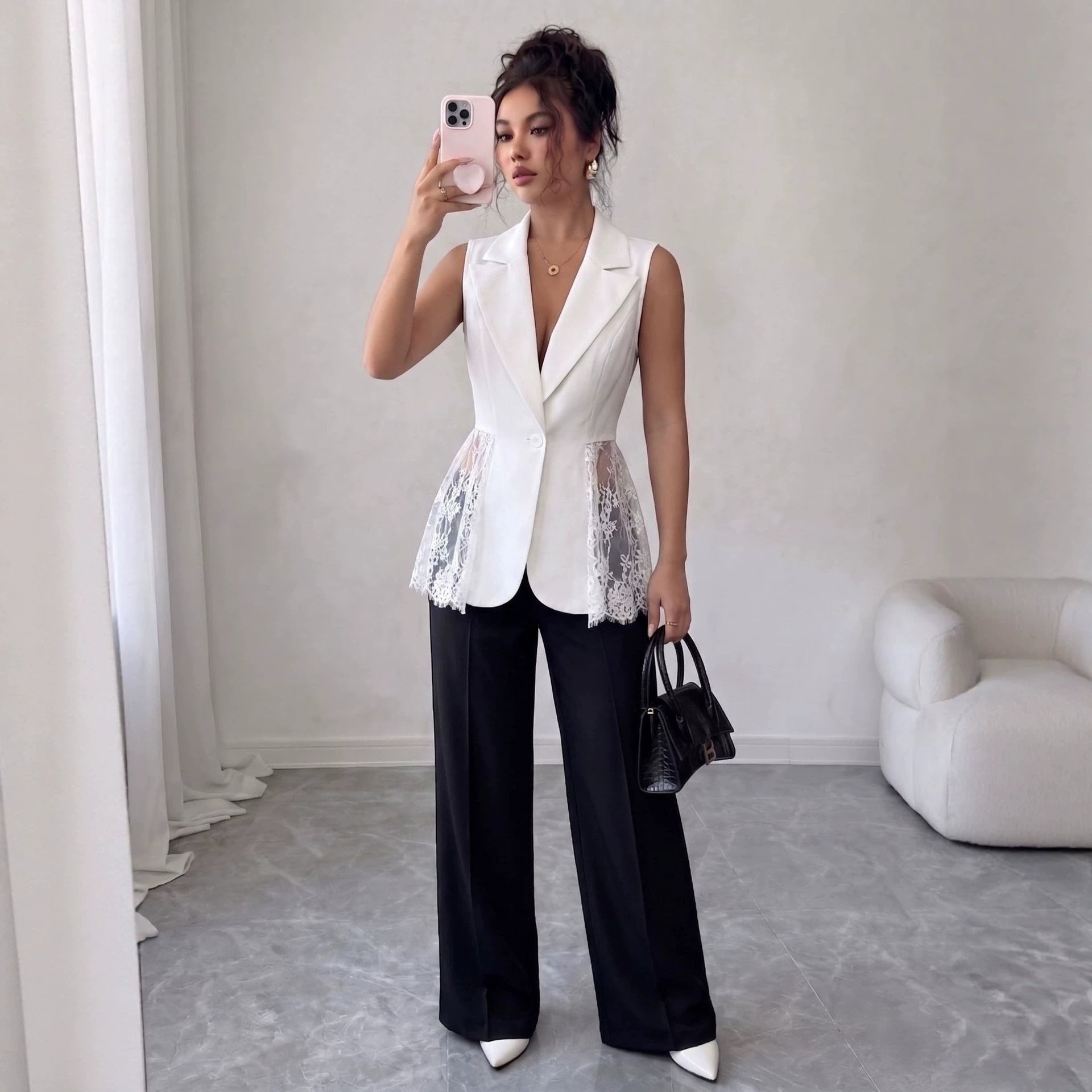 Veste trapèze sans manches coupe ajustée