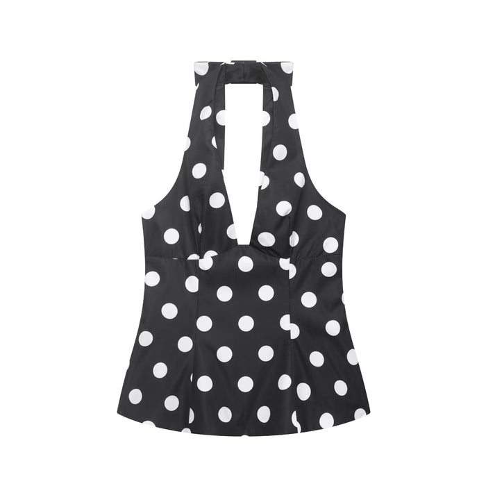 Top sin mangas con cuello halter, lunares y lazo decorativo