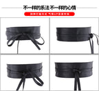 Obi waist belt styled with knitwear