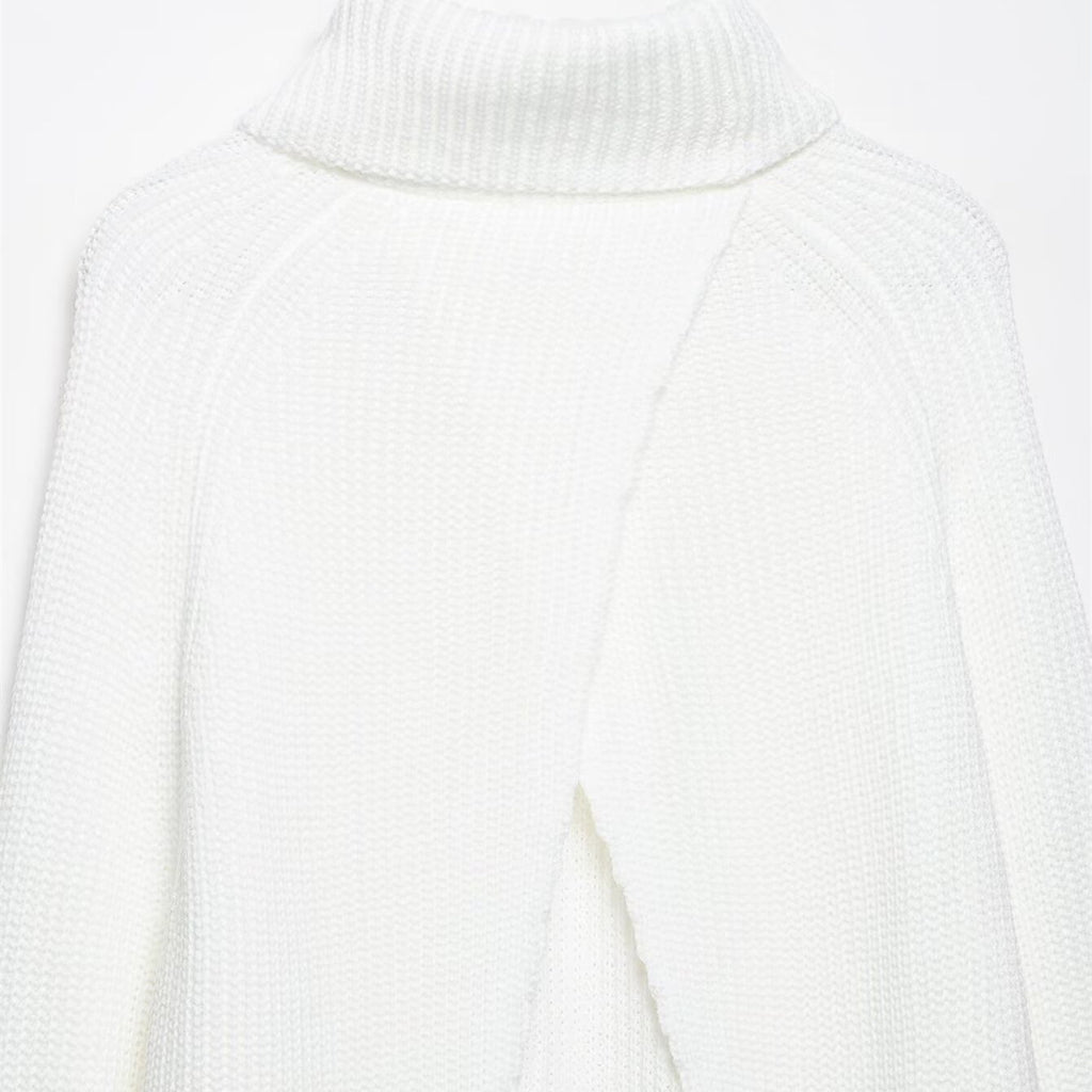 Pull en maille ample à col montant, fendu et de couleur unie