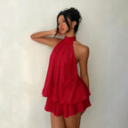Robe d'été ajustée dos nu à licou et taille nouée, avec jupe courte bouffante pour femme