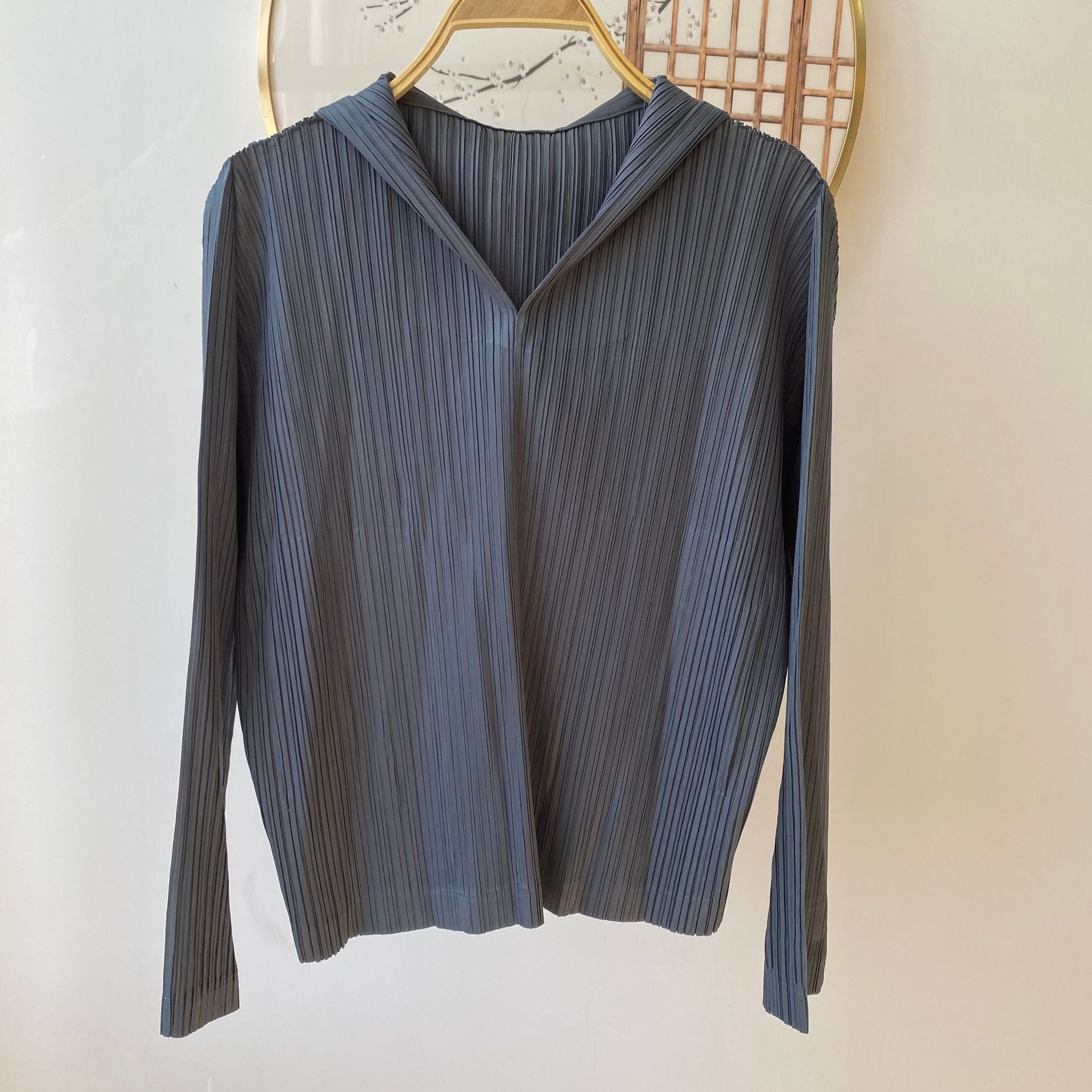 Sudadera casual plisada de alta gama con capucha
