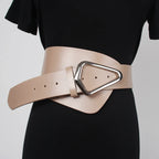 Asymmetric wide belt styled over tailoring