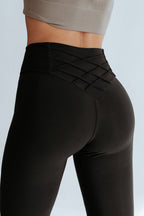 Leggings de cintura alta cruzados negros con control de abdomen