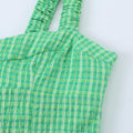 Vestido corto de tirantes con estampado de cuadros y estilo picante