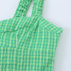 Vestido corto de tirantes con estampado de cuadros y estilo picante