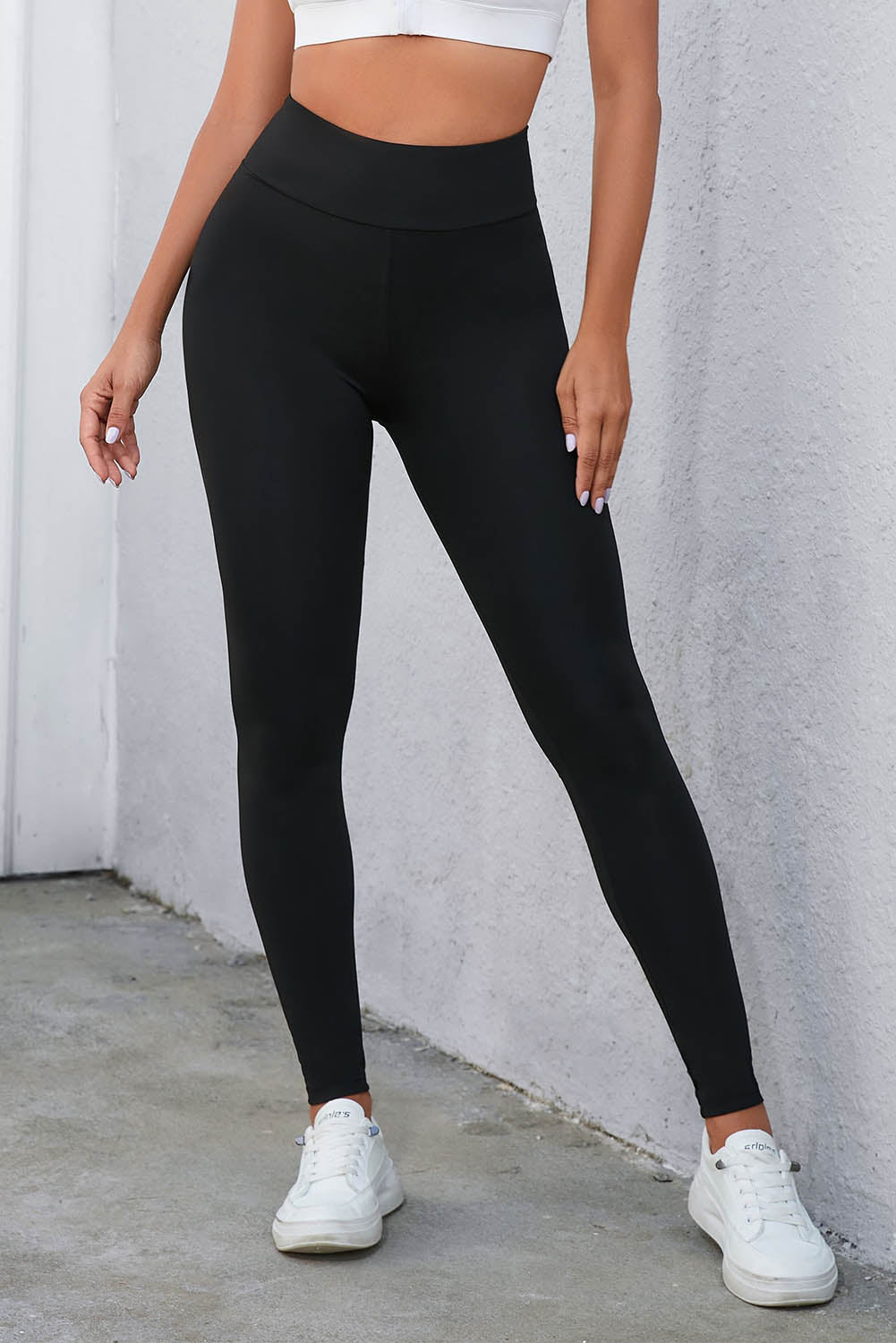 Leggings de cintura alta cruzados negros con control de abdomen
