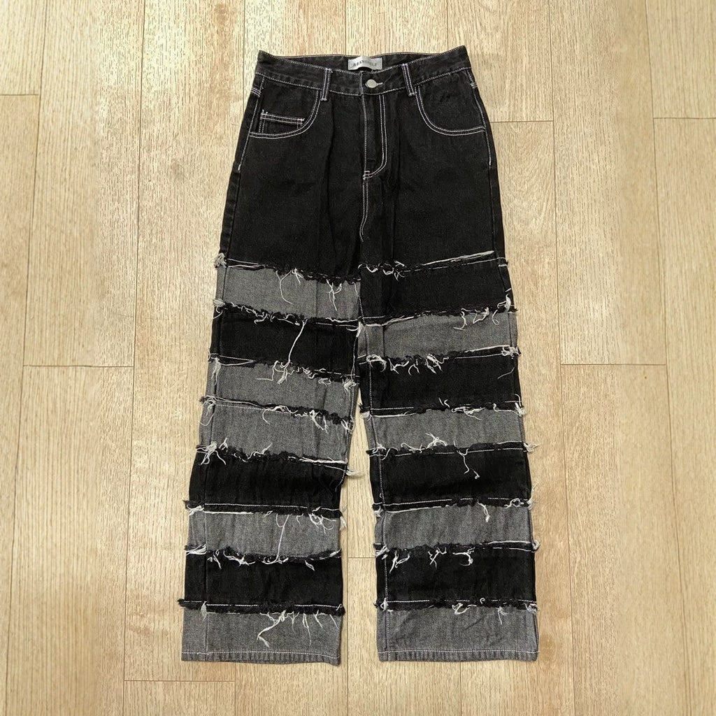 Pantalon en jean streetwear patchwork noir et gris à ourlet brut