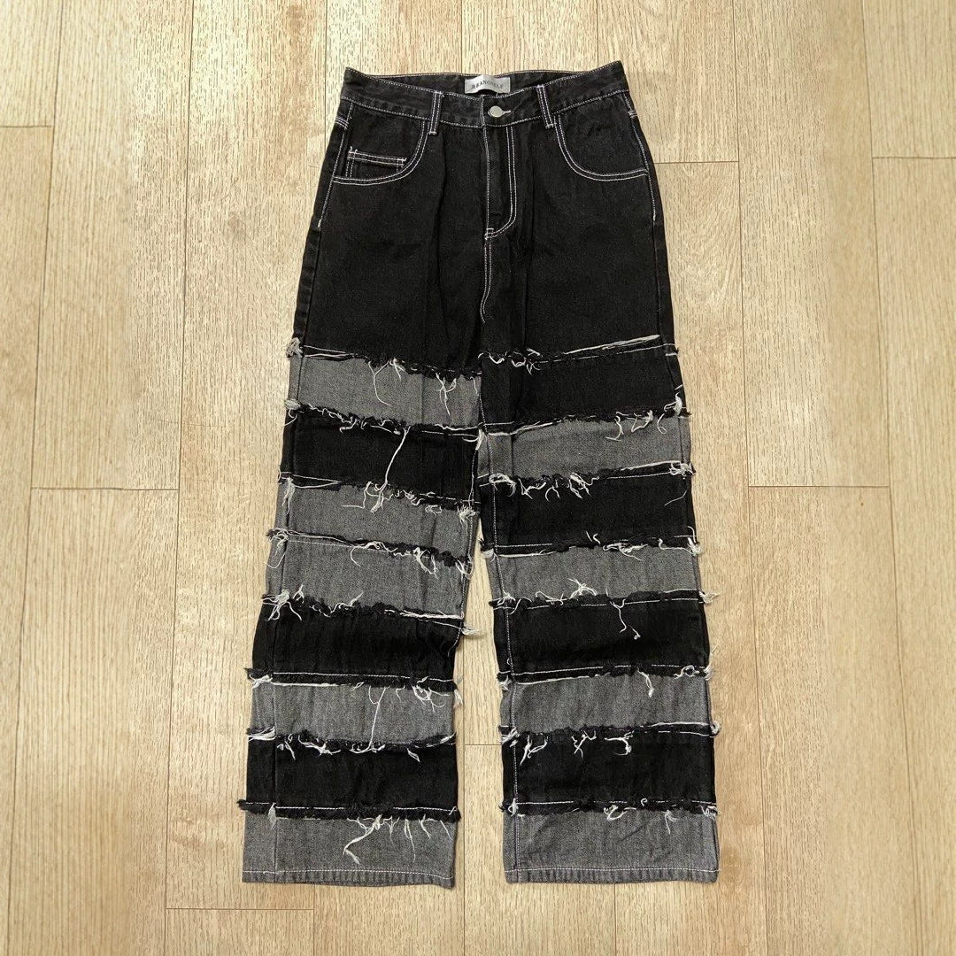 Pantalon en jean streetwear patchwork noir et gris à ourlet brut