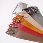 Asymmetric wide belt worn at the waist