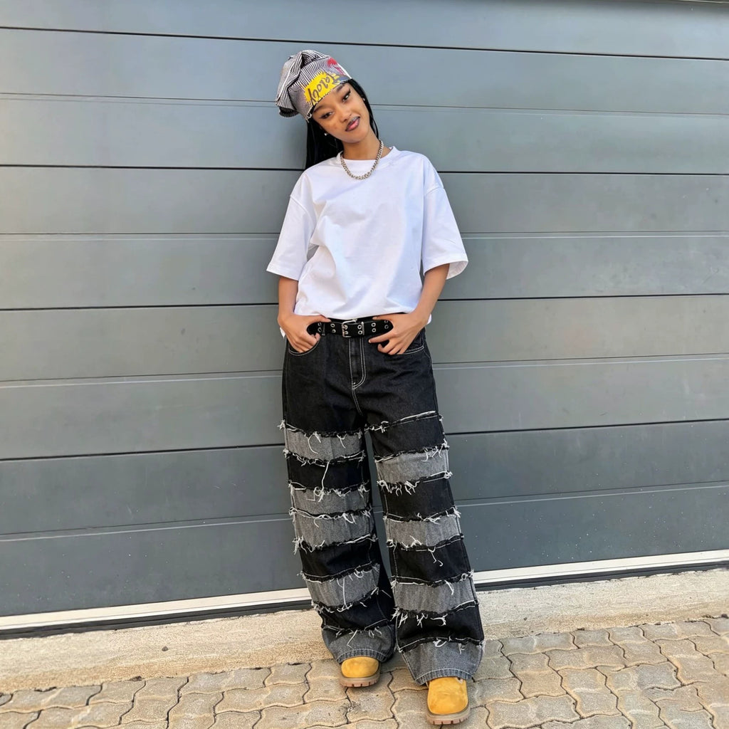 Pantalon en jean streetwear patchwork noir et gris à ourlet brut