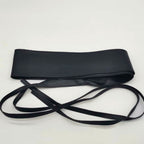 Obi waist belt tied in a bow at the waist
