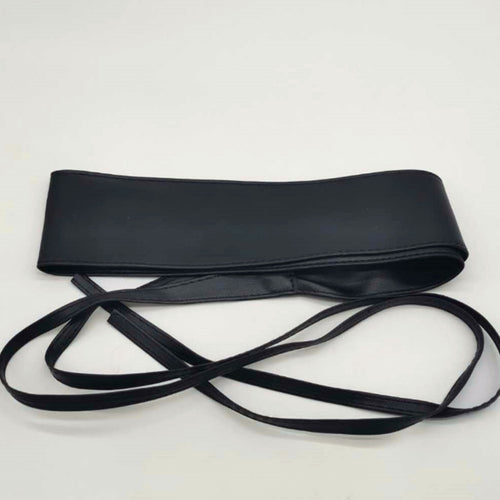Obi waist belt tied in a bow at the waist