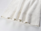 Robe croisée à col rond et manches longues