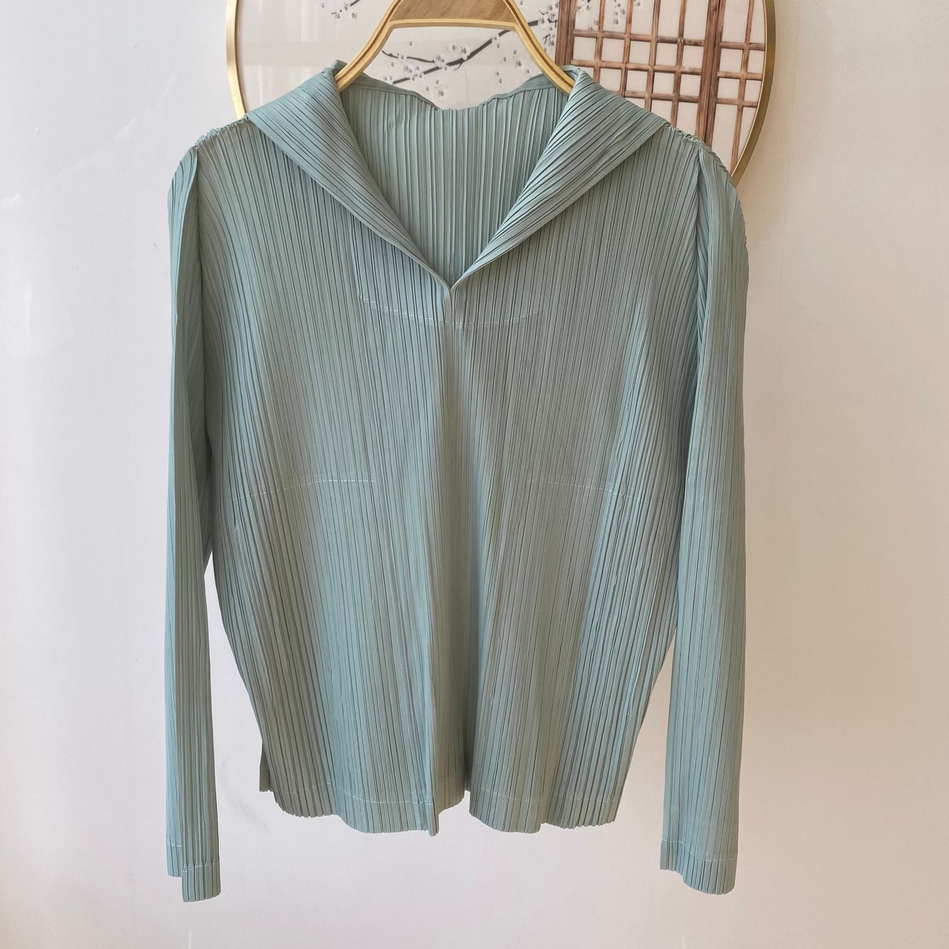Sudadera casual plisada de alta gama con capucha