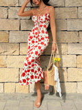 Robe longue ajustée à fines bretelles, style vacances romantiques et vintage à la plage, avec corsage cache-cœur floral et taille nouée