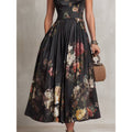 Vestido entallado sin mangas, con falda larga y estampado floral tridimensional en negro