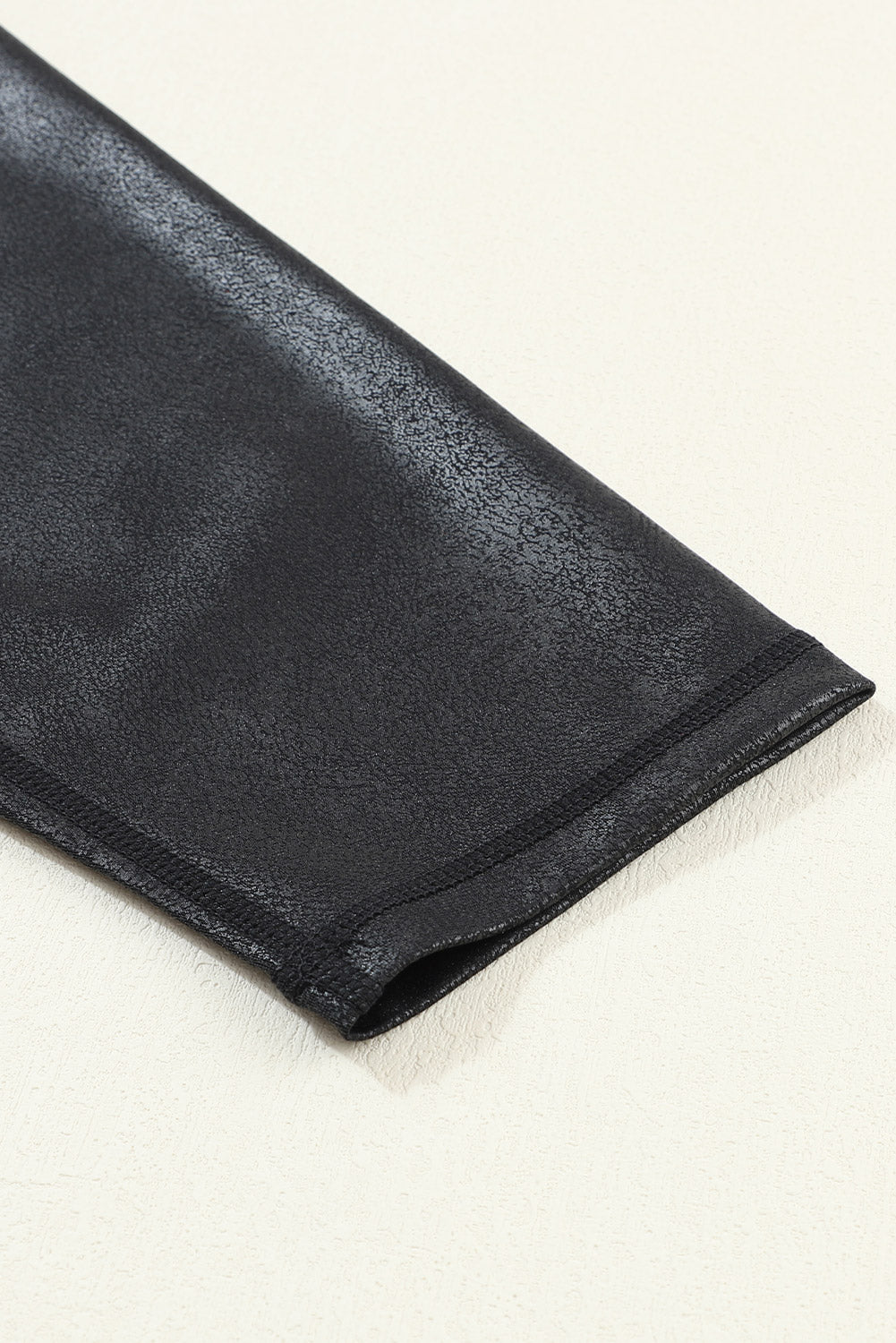 Legging en cuir élégant bleu marine avec taille échancrée croisée