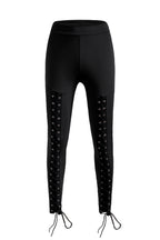 Leggings negros con cordones en la parte delantera